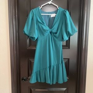 Green mini with opening above waist area